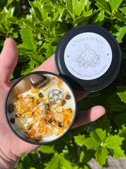 Citrine and Tiger Eye crystals topping candle with crystal chips