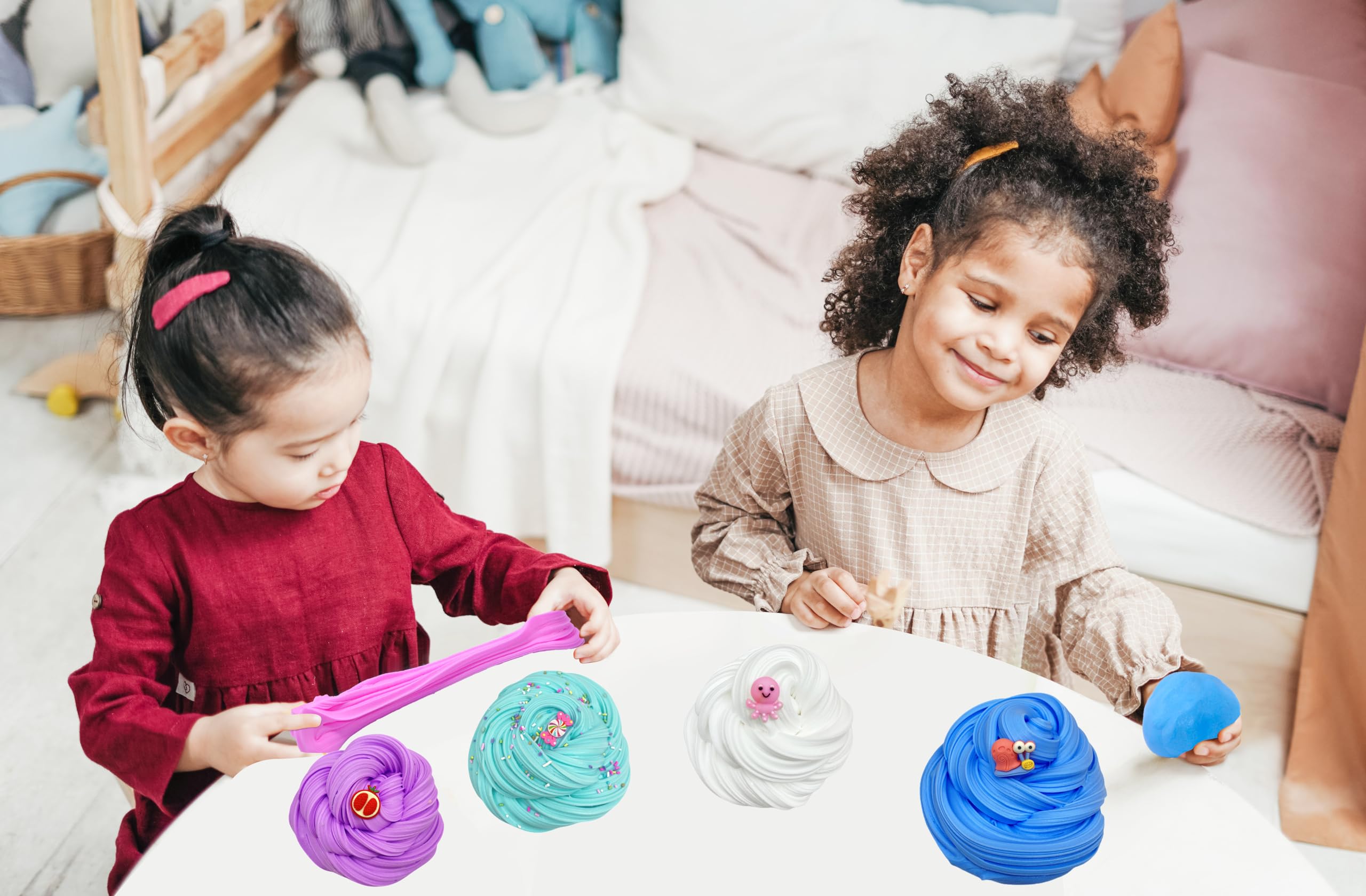 Multi colored butter slimes with charms included in kit