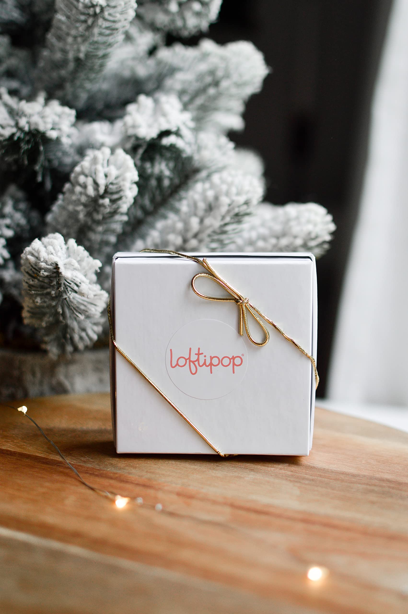 White gift box with gold decorative stretch loop for Loftipop ornament