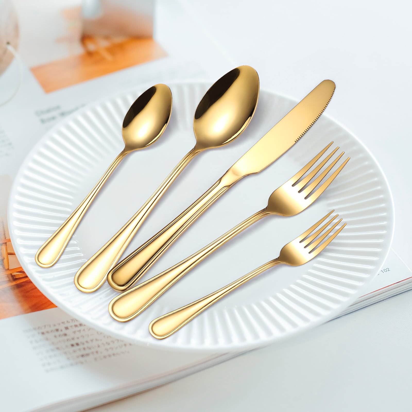 Gold flatware set four place setting packing