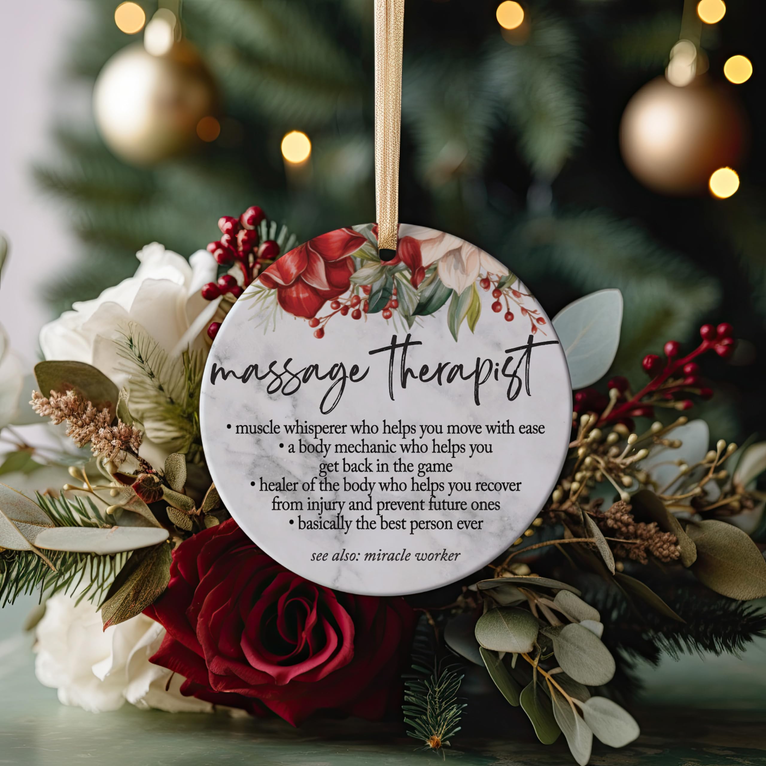 glossy ceramic ornament with gold ribbon