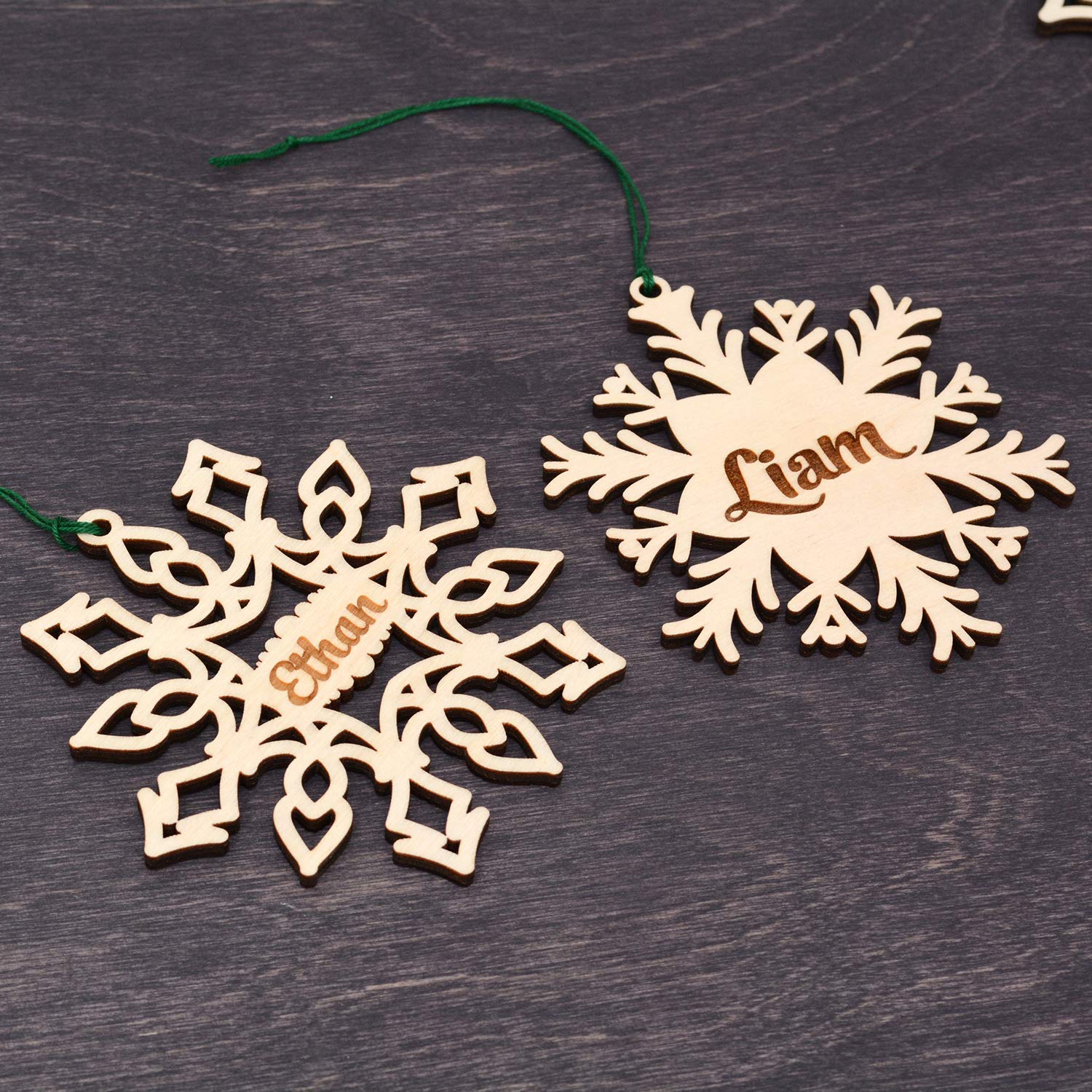 Five matching wooden ornaments for tree