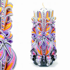 Magnificent 9 inch carved candle in yellow purple pink