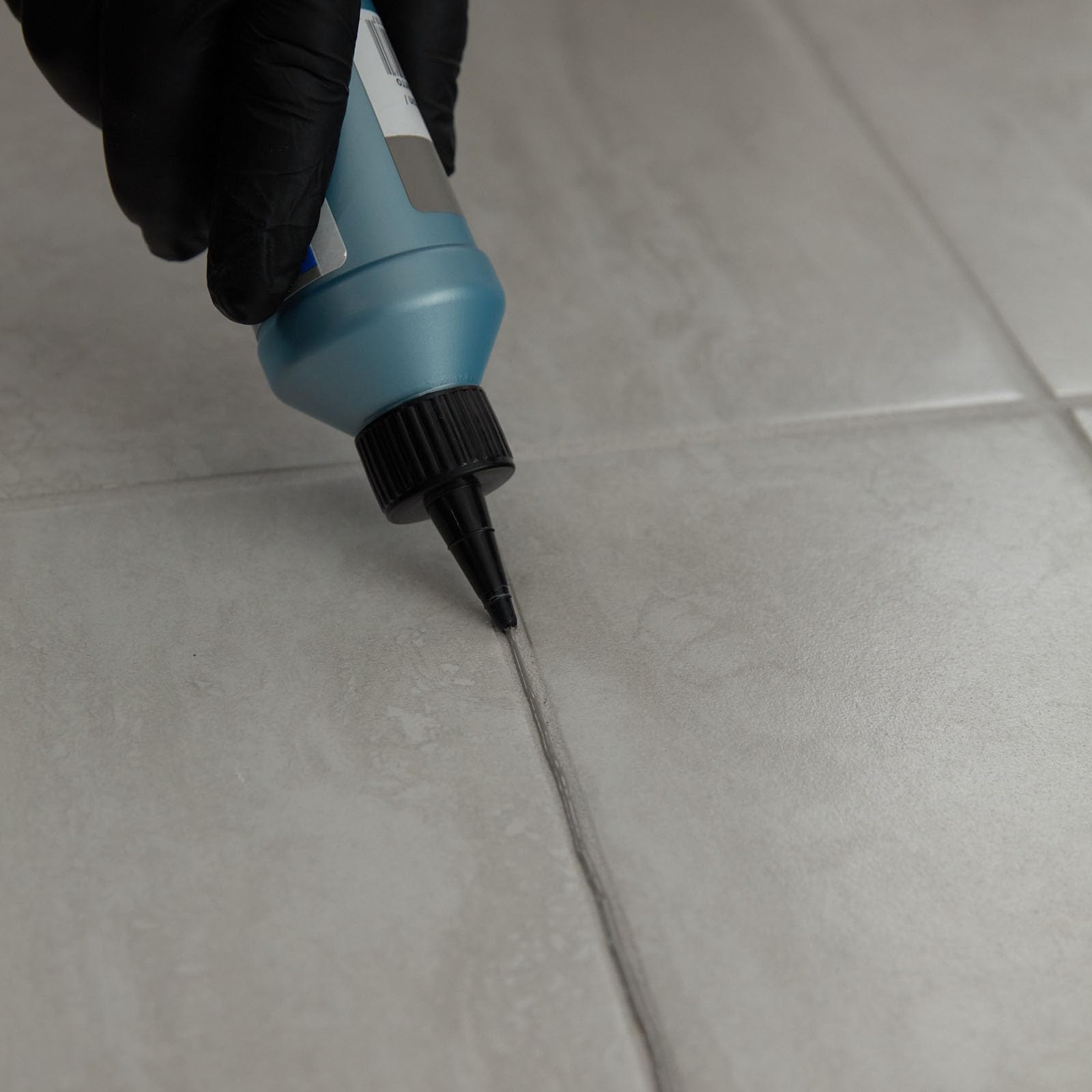 Charcoal color variant 5047 of MAPEI UltraCare Grout Refresh