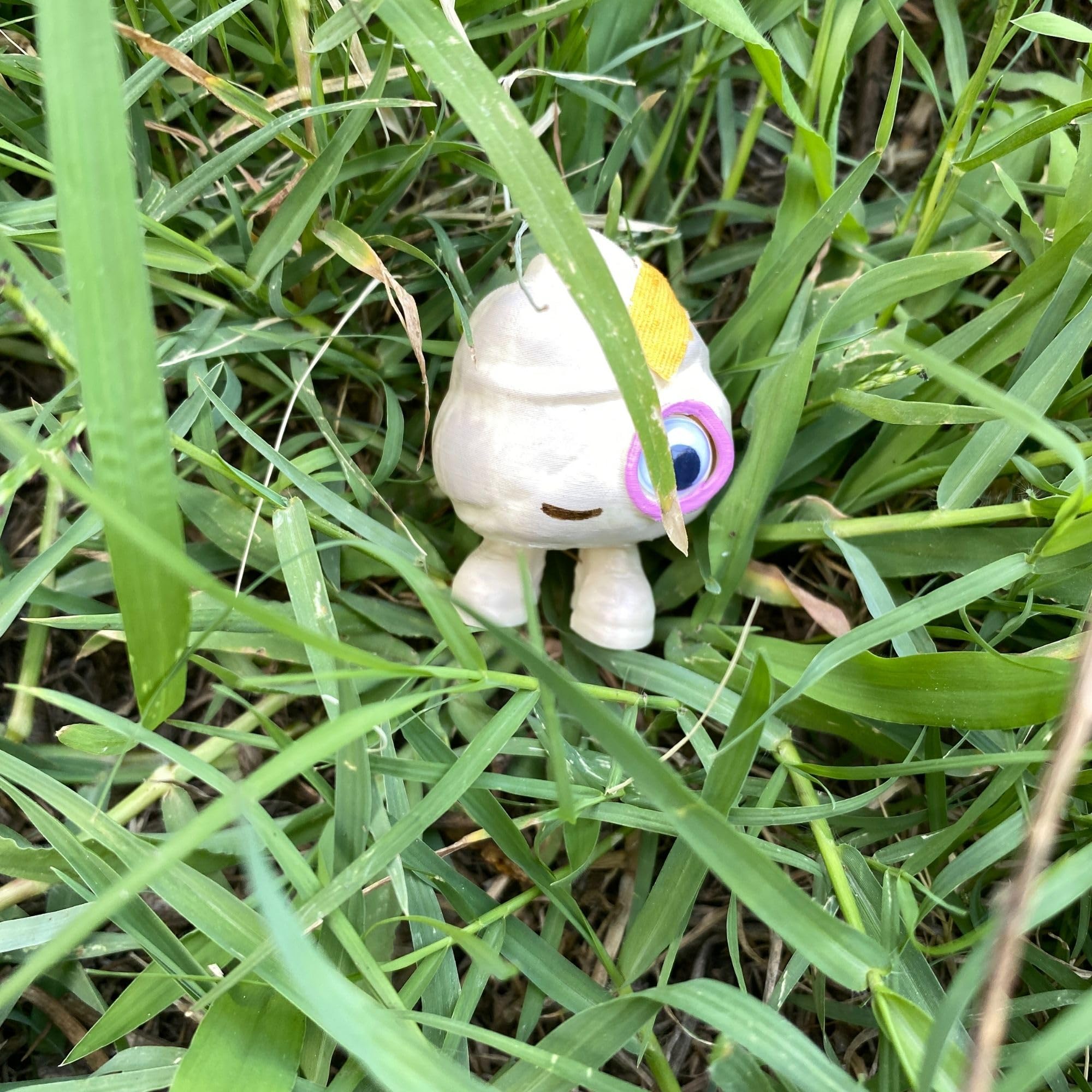 Marcel The Shell with Shoes On themed figure on shelf