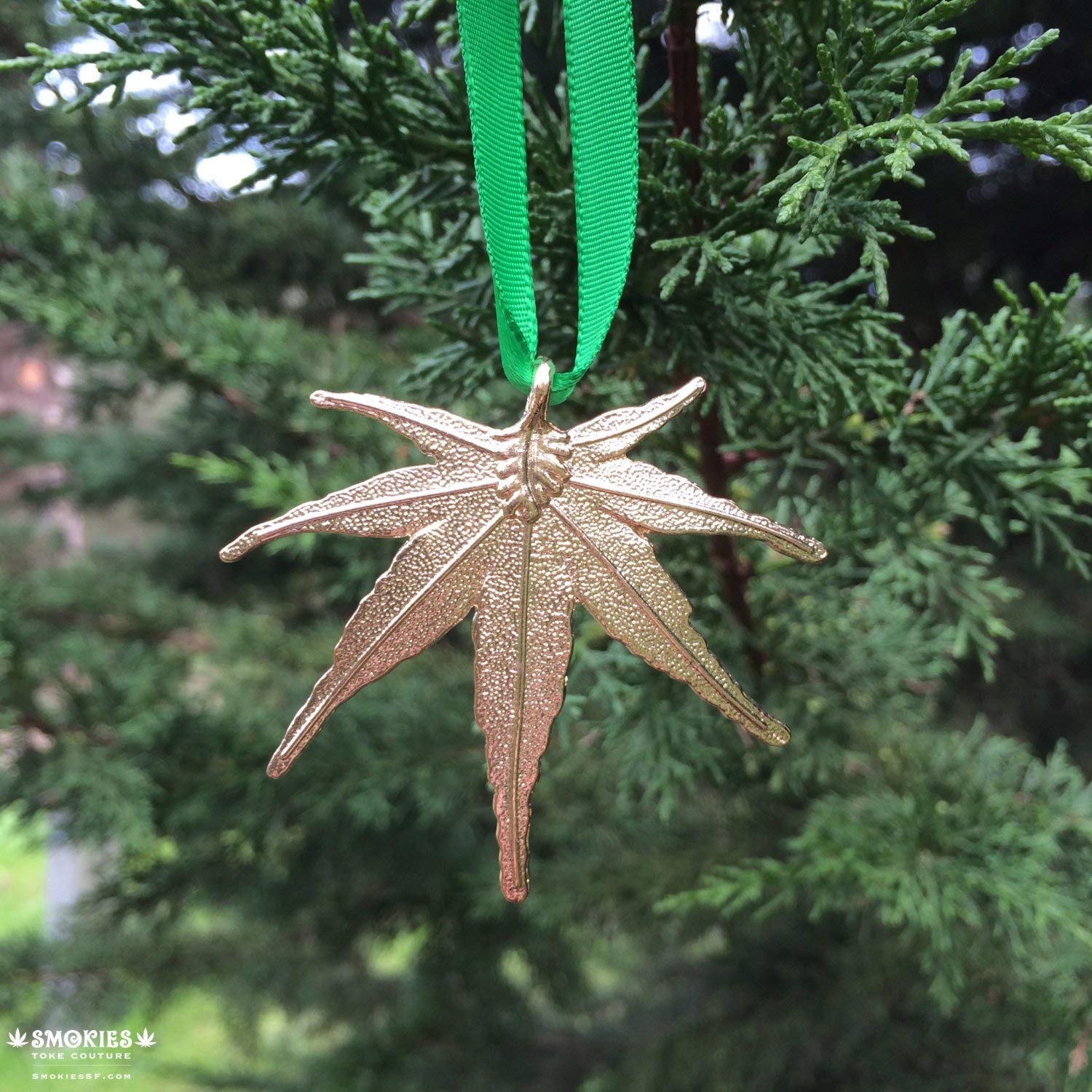 Embossed cannabis leaf ornament with dual-sided pattern