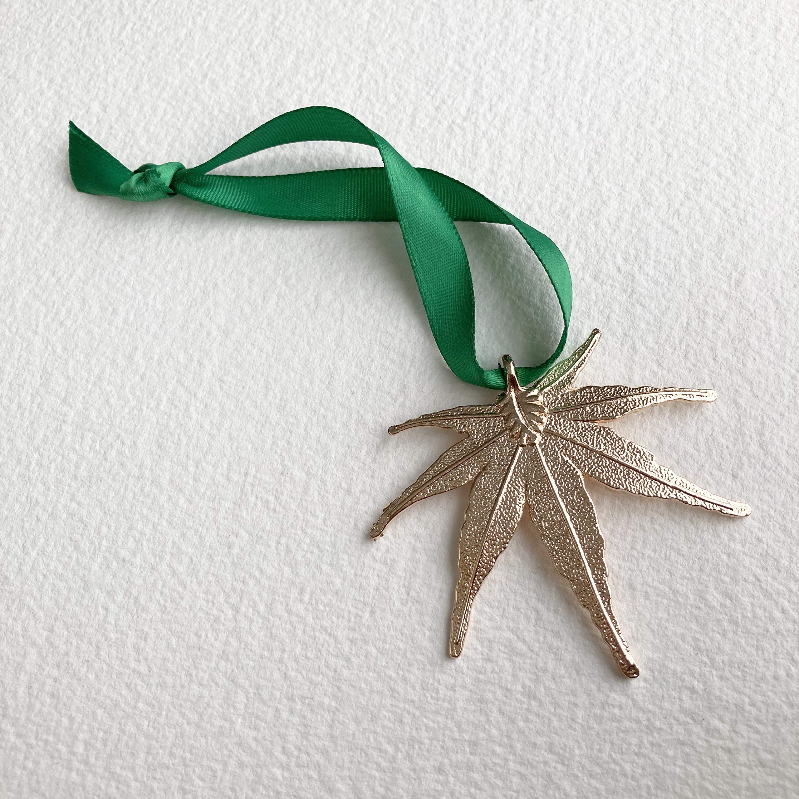 Gold cannabis leaf ornament for holiday decoration