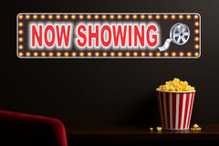 Marquee style home theater sign with Now Showing graphic