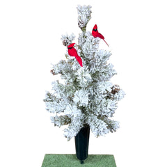 Martin's cemetery cone memorial decoration graveside display featuring a snowy Christmas tree pinecones and red birds