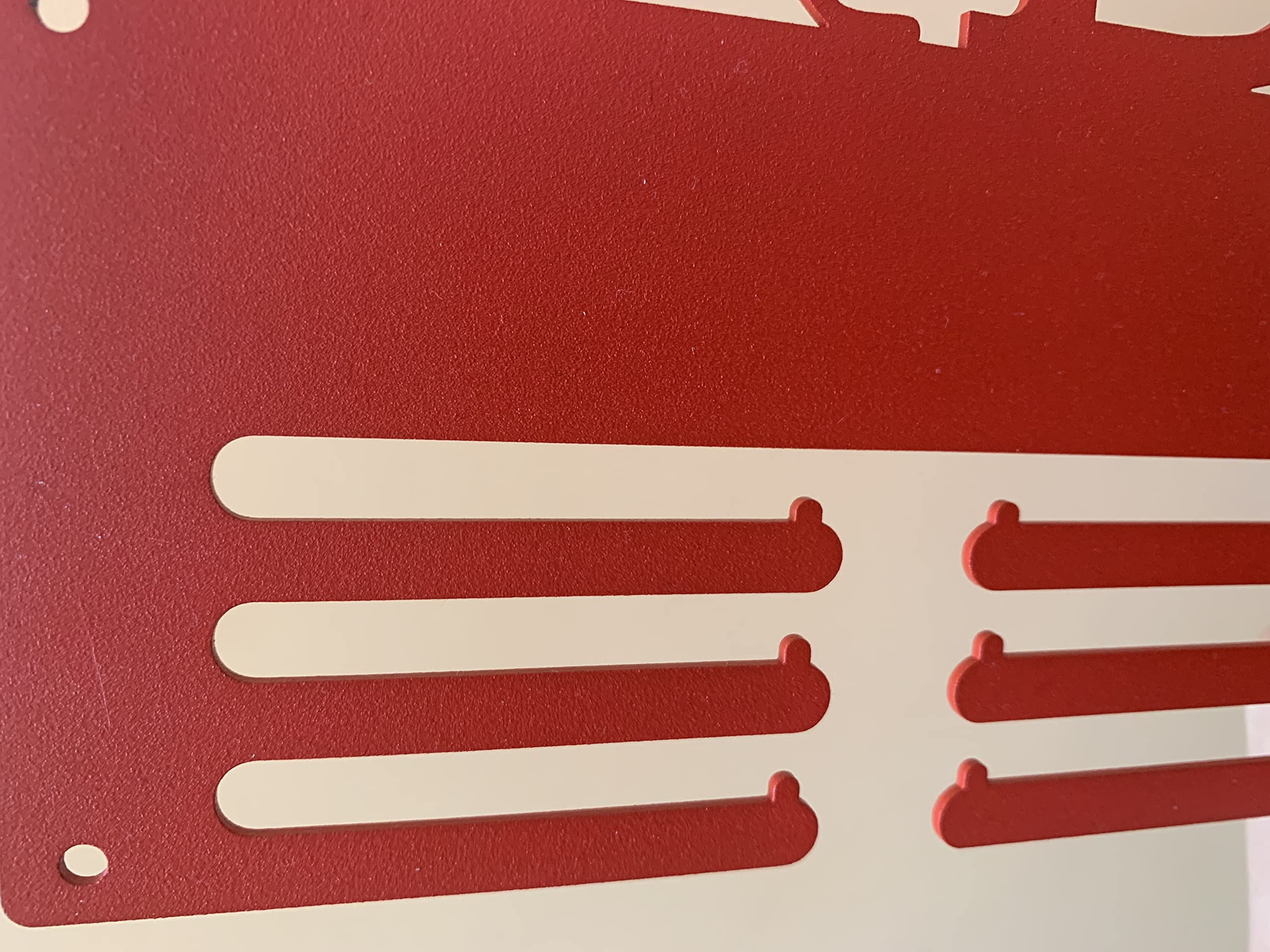 Medal hanger with four hanging holes on sides