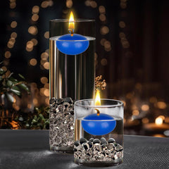 Blue floating disc candles used as table centerpieces and decor