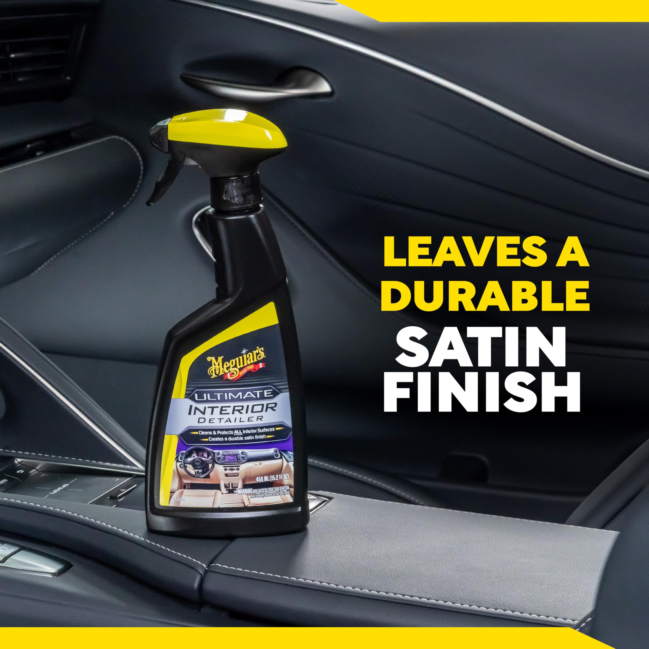 Steering wheel being cleaned with Meguiar's spray