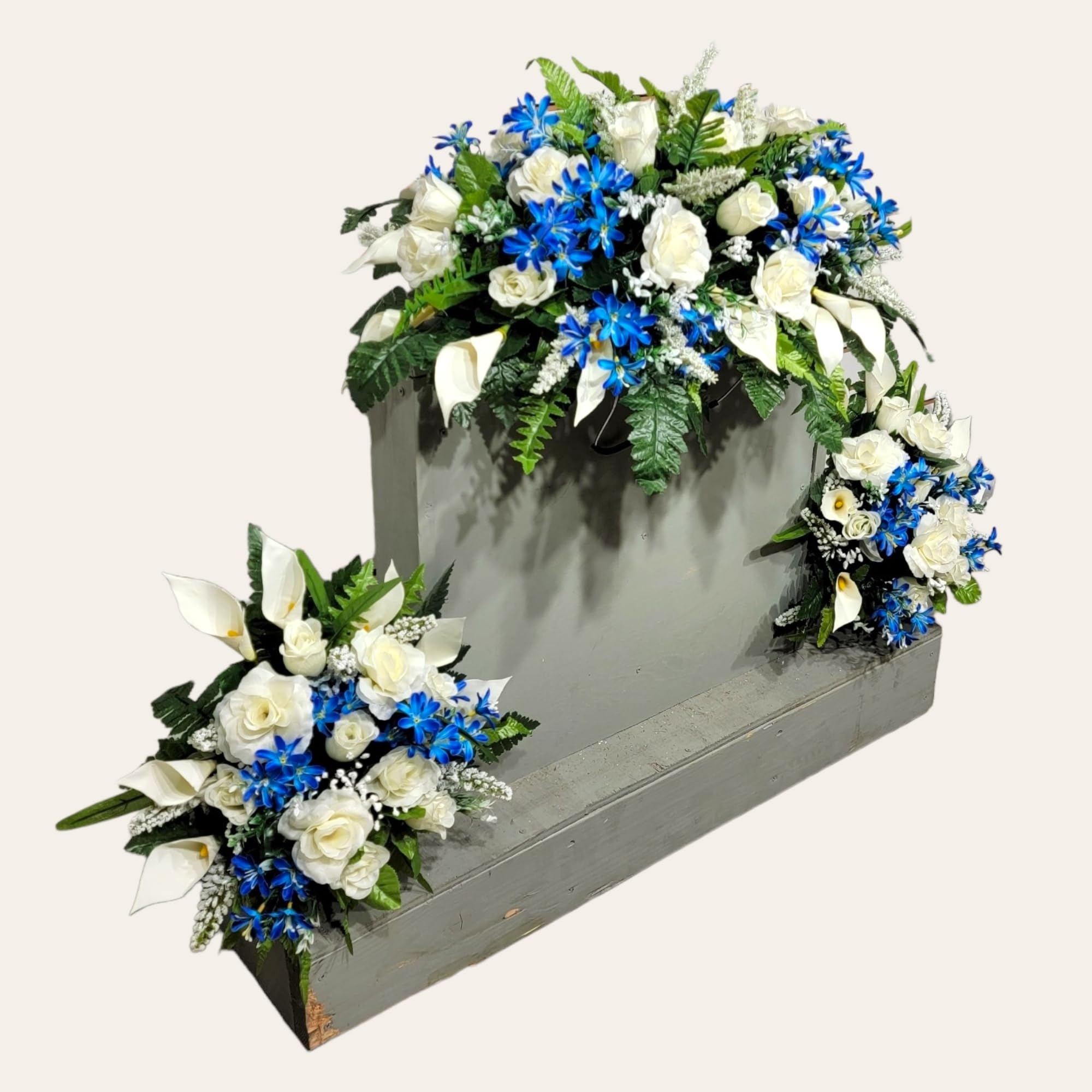Memorial flowers headstone saddle four legs