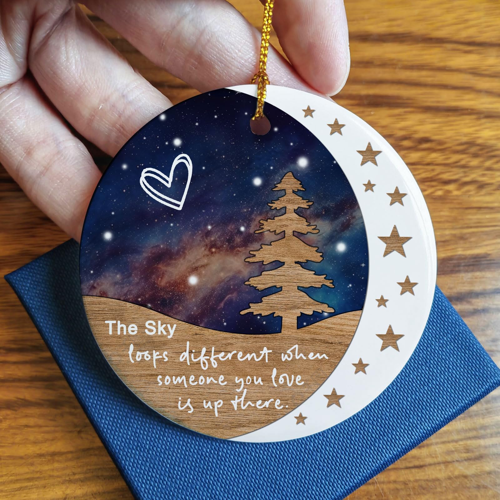 Ceramic memorial ornament with golden hanging string