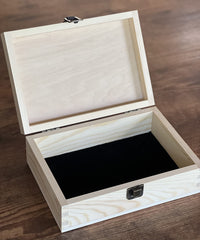 Interior lined in black suede for protecting photos and mementos