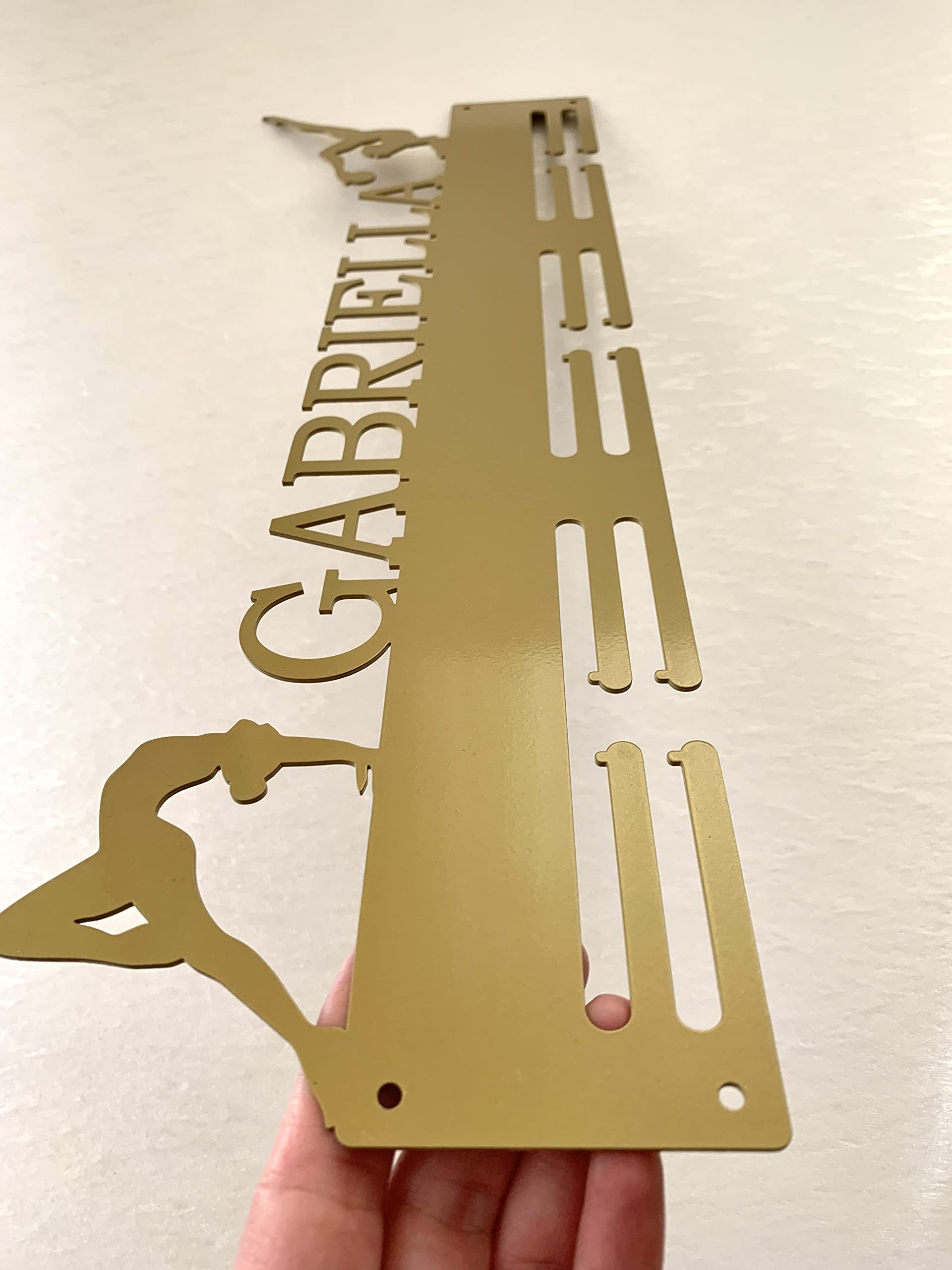 Metal medal holder for gymnasts