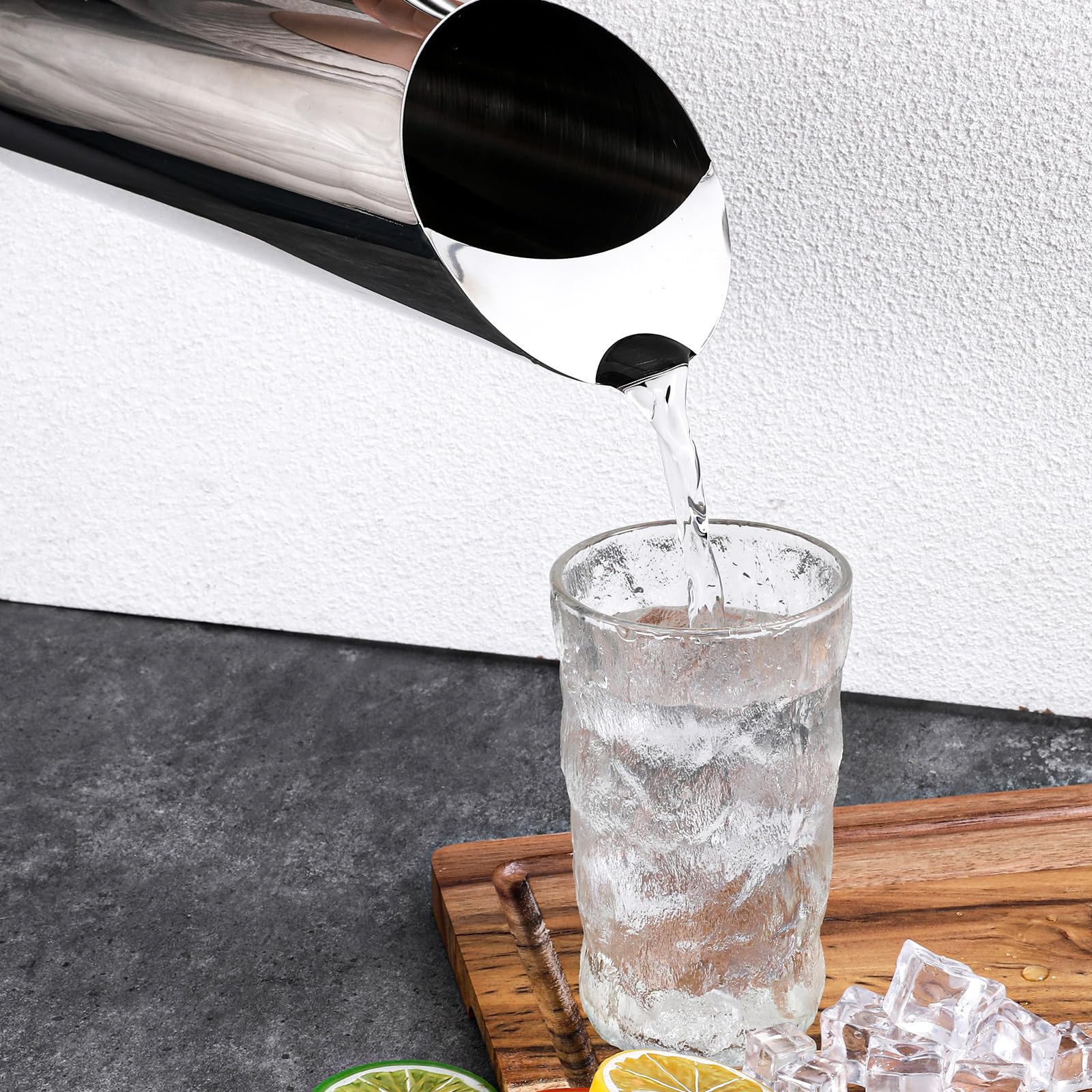 Metal pitcher with handle for easy pouring