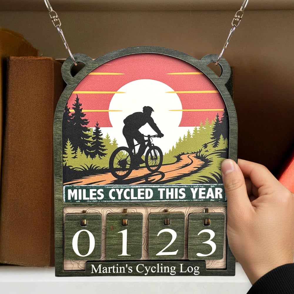 Miles Cycled This Year quote design on sign