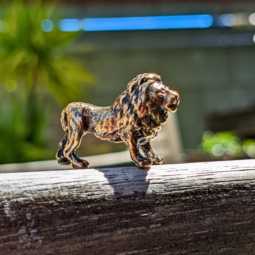 Compact brass lion figurine image
