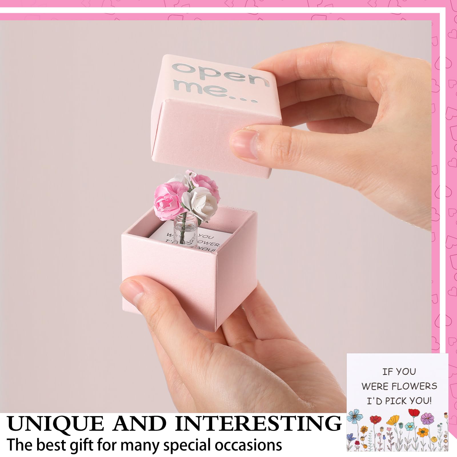 mini rose bouquet inside glass bottle in pink gift box