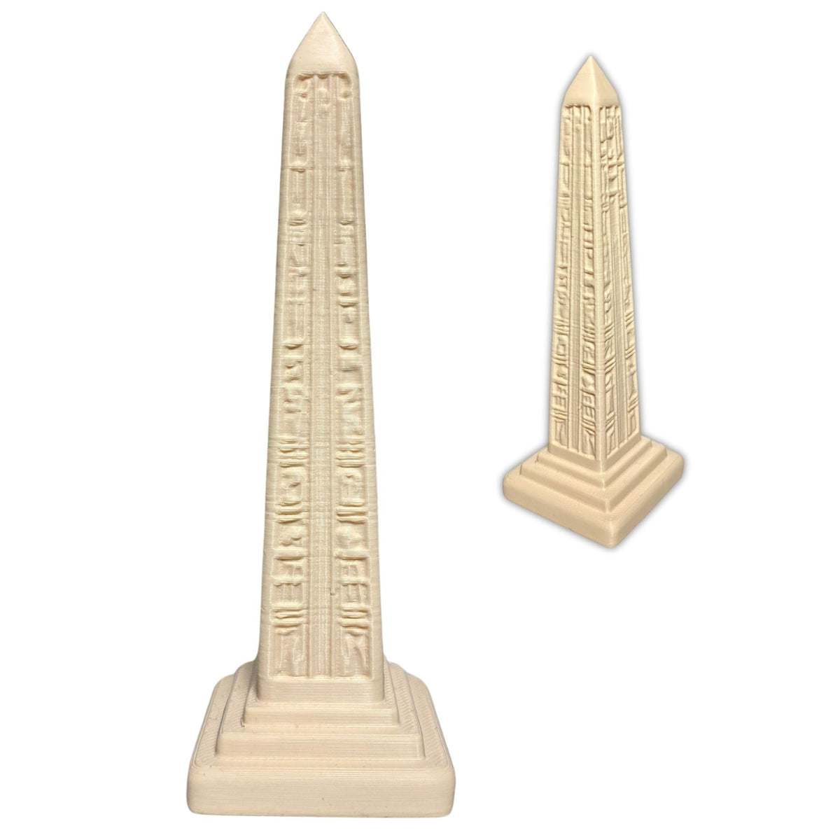 Miniature Egyptian Inspired Obelisk decorative sculpture on desk