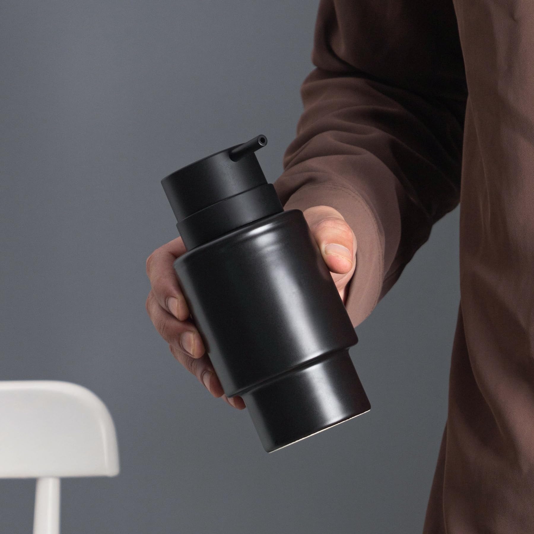 Minimalist black ceramic soap dispenser