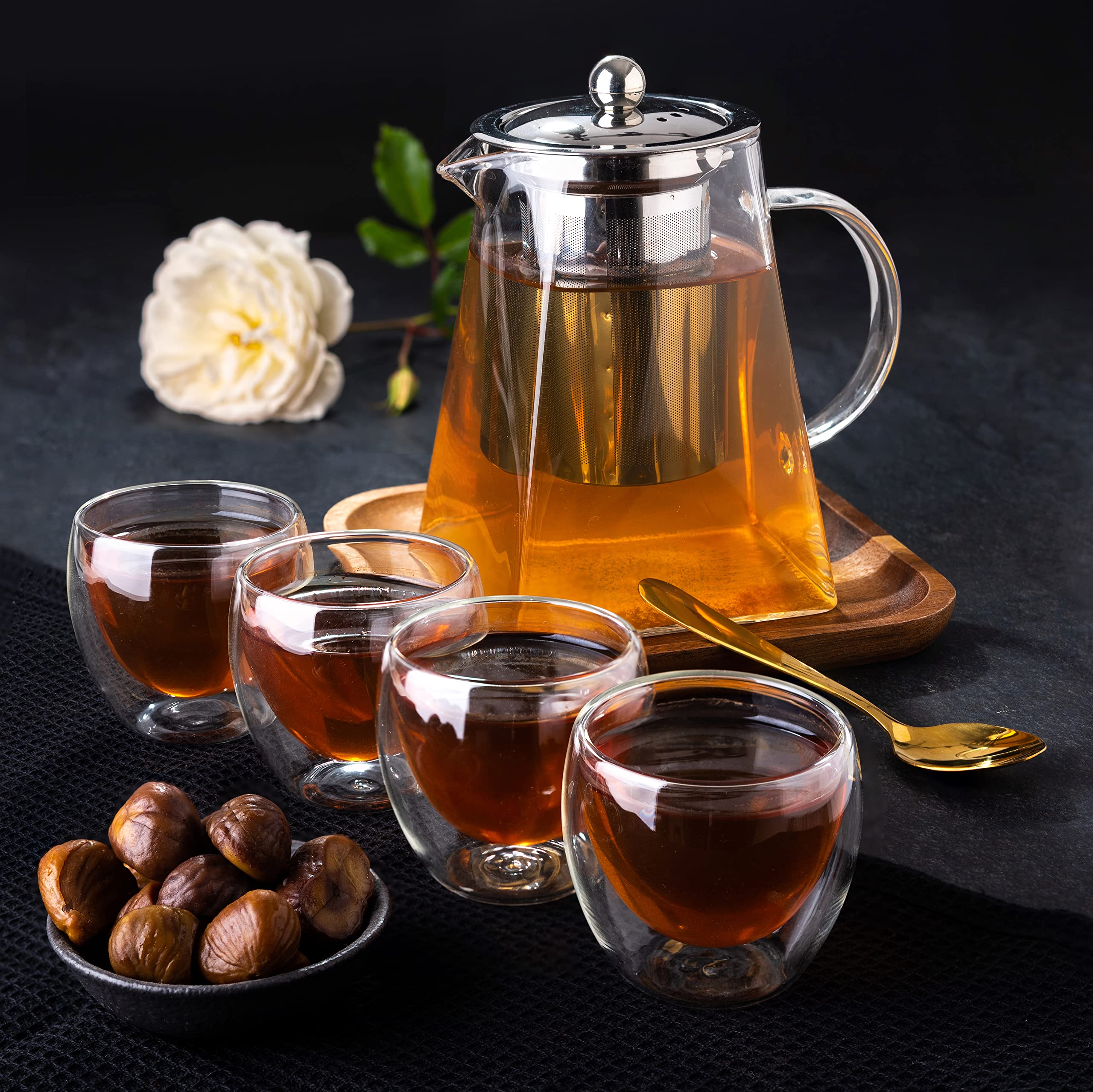 Stovetop safe glass teapot with ergonomic handle
