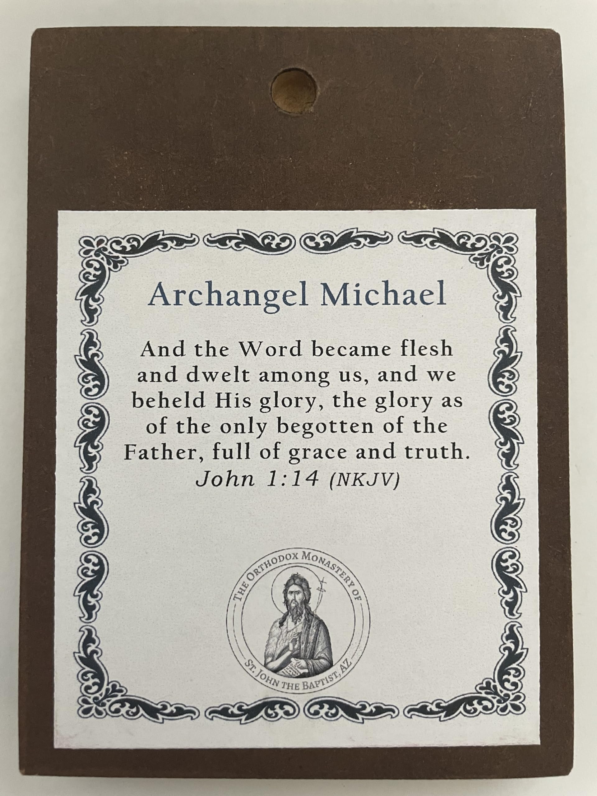 Icon designed for wall or shelf display with back hanging hole