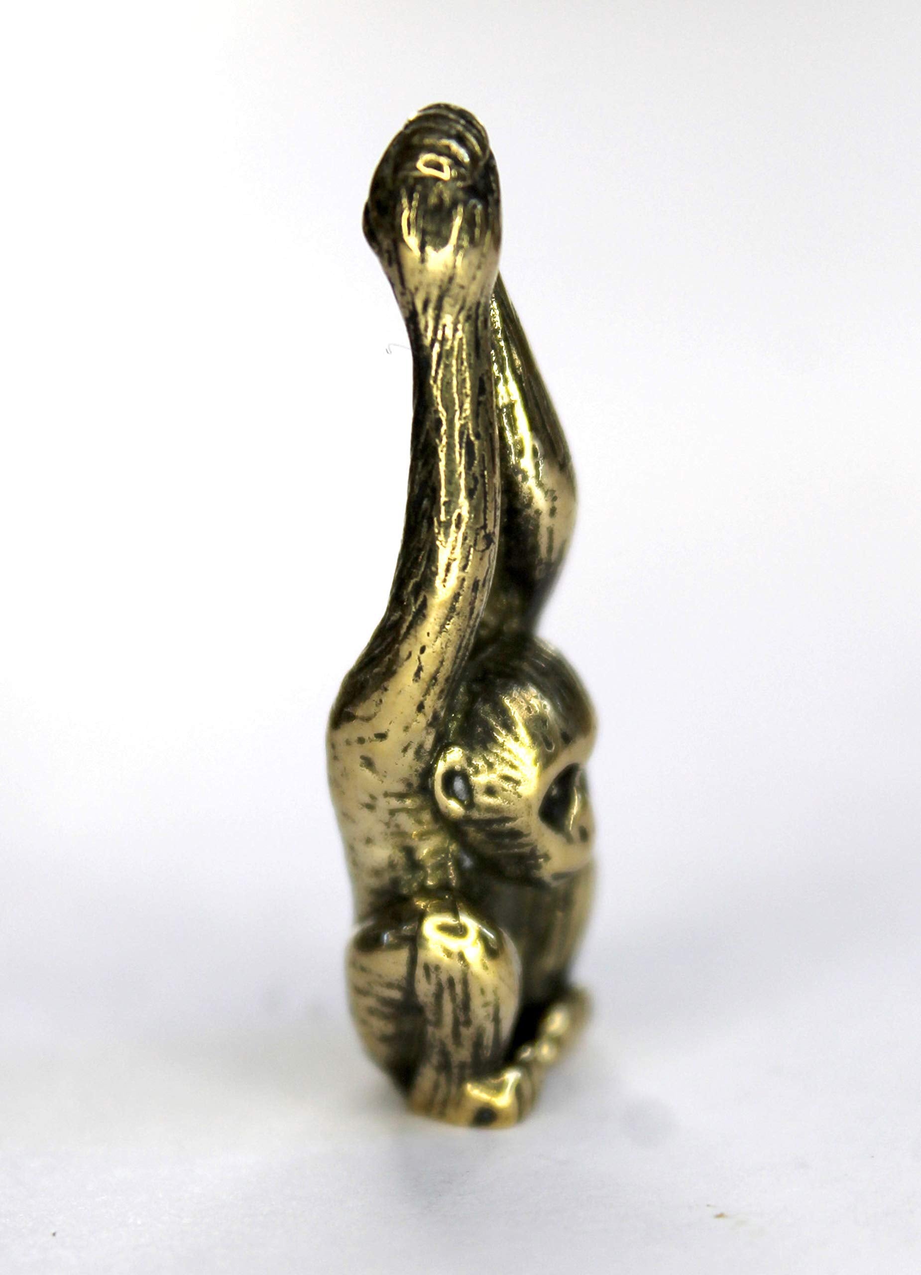Compact 3.5 cm tall brass monkey sculpture