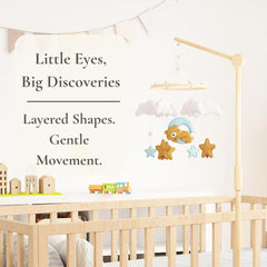 Handmade felt teddy bear hung on natural beech wood ring