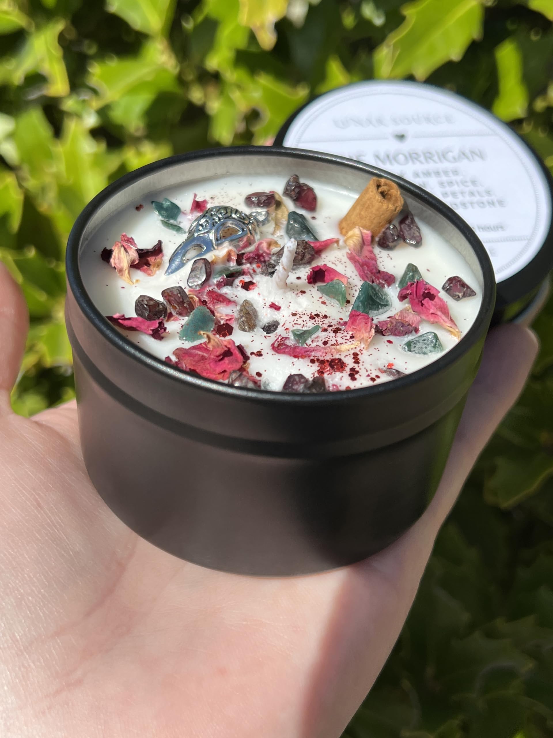 Altar ritual setting with The Morrigan candle