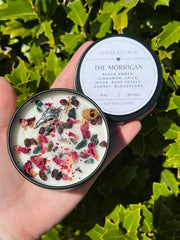 Notes of cypress fir plum saffron cinnamon on Morrigan candle