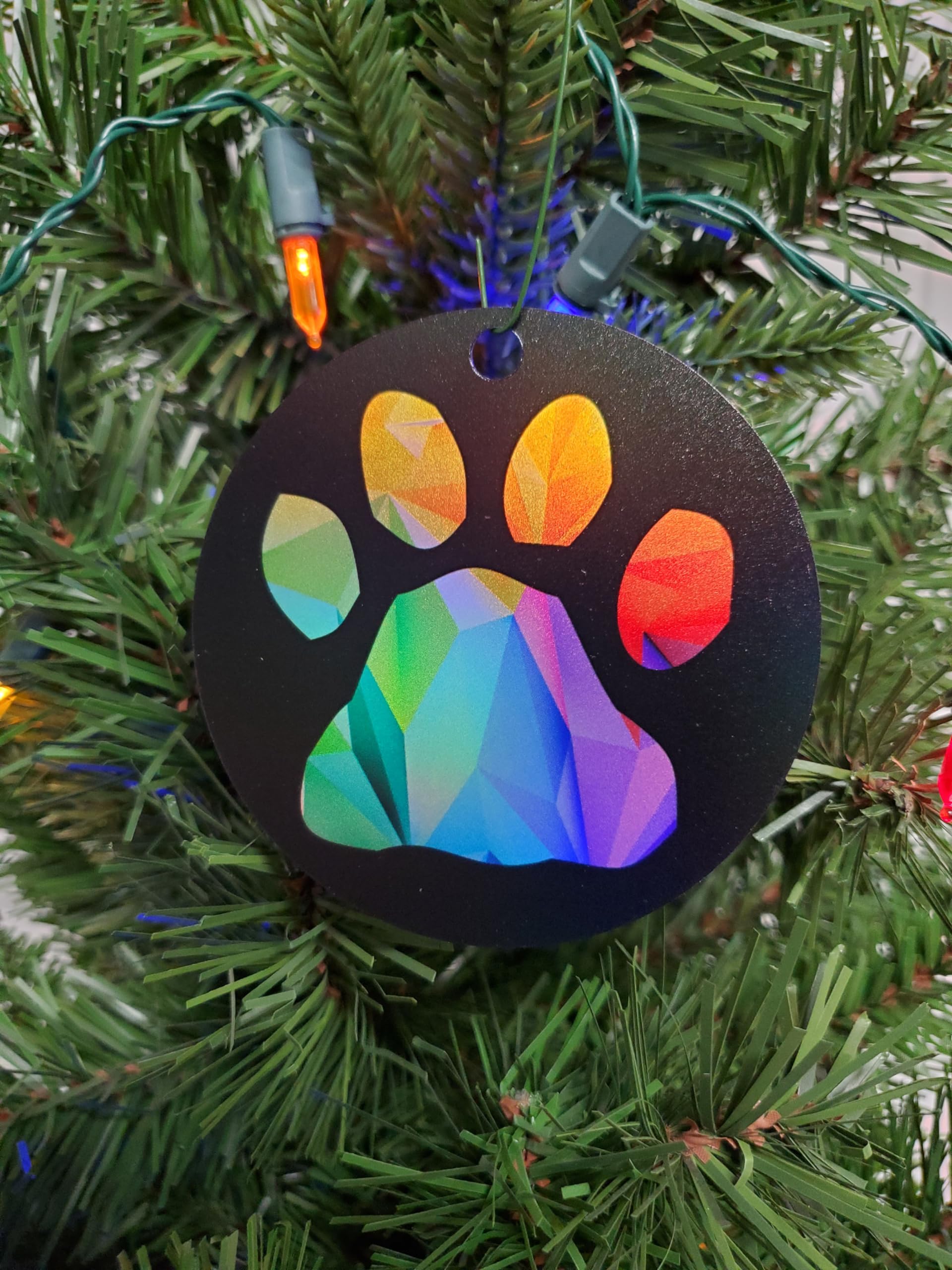Double-sided holographic Mountain Cur ornament for holiday display