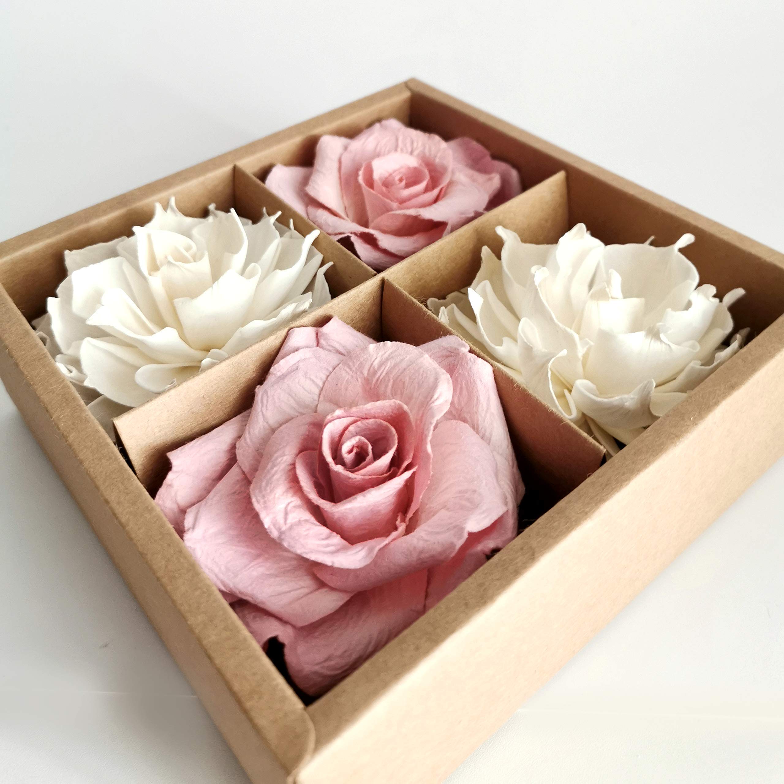 Two pink rose mulberry paper flowers included in diffuser kit