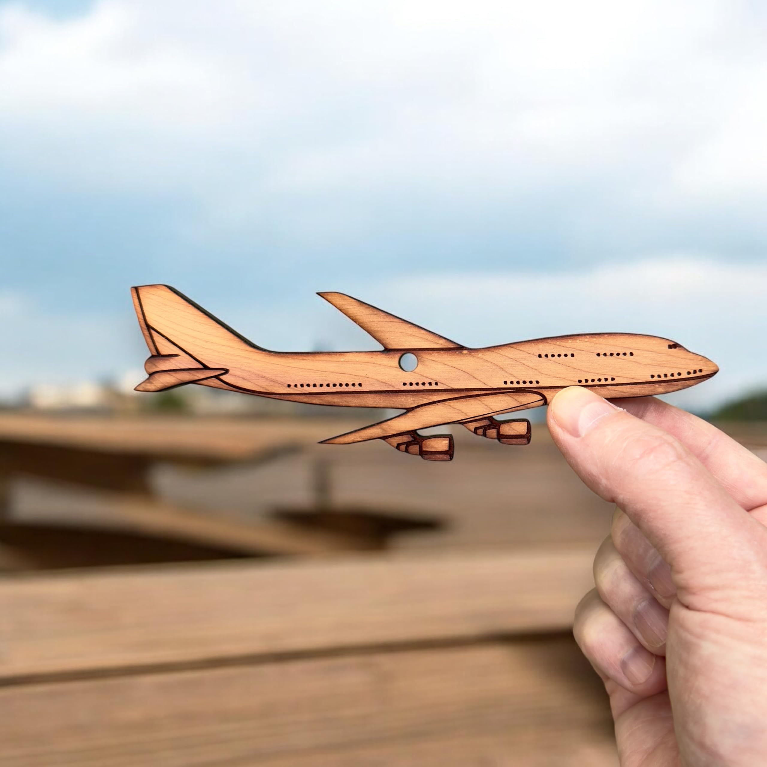Natural cedar color and grain of 747 Jet Airplane Cedar Ornament