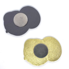 hard enamel needle minder about 2 inches wide