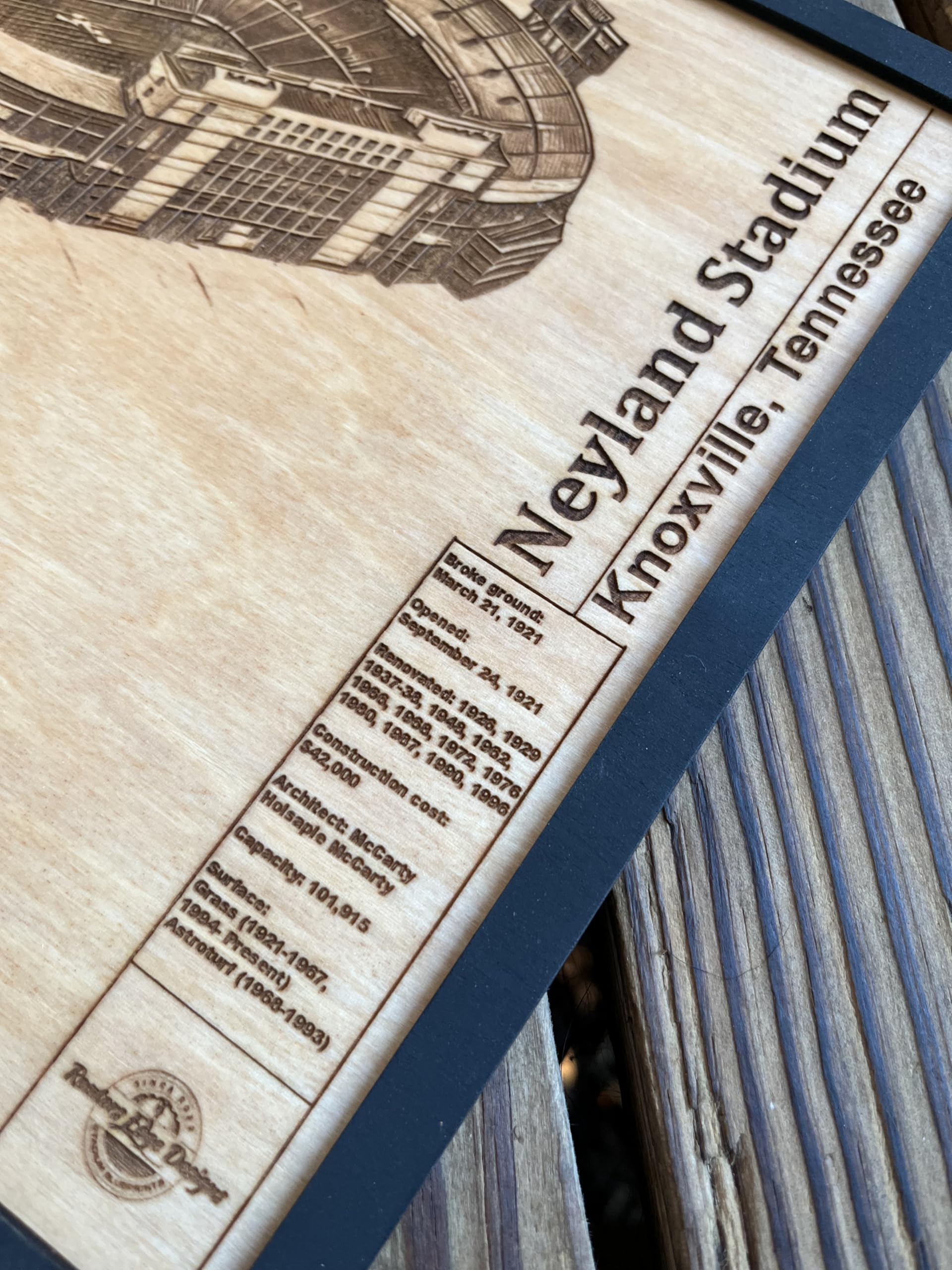 Close up of laser engraving on real wood stadium wall art