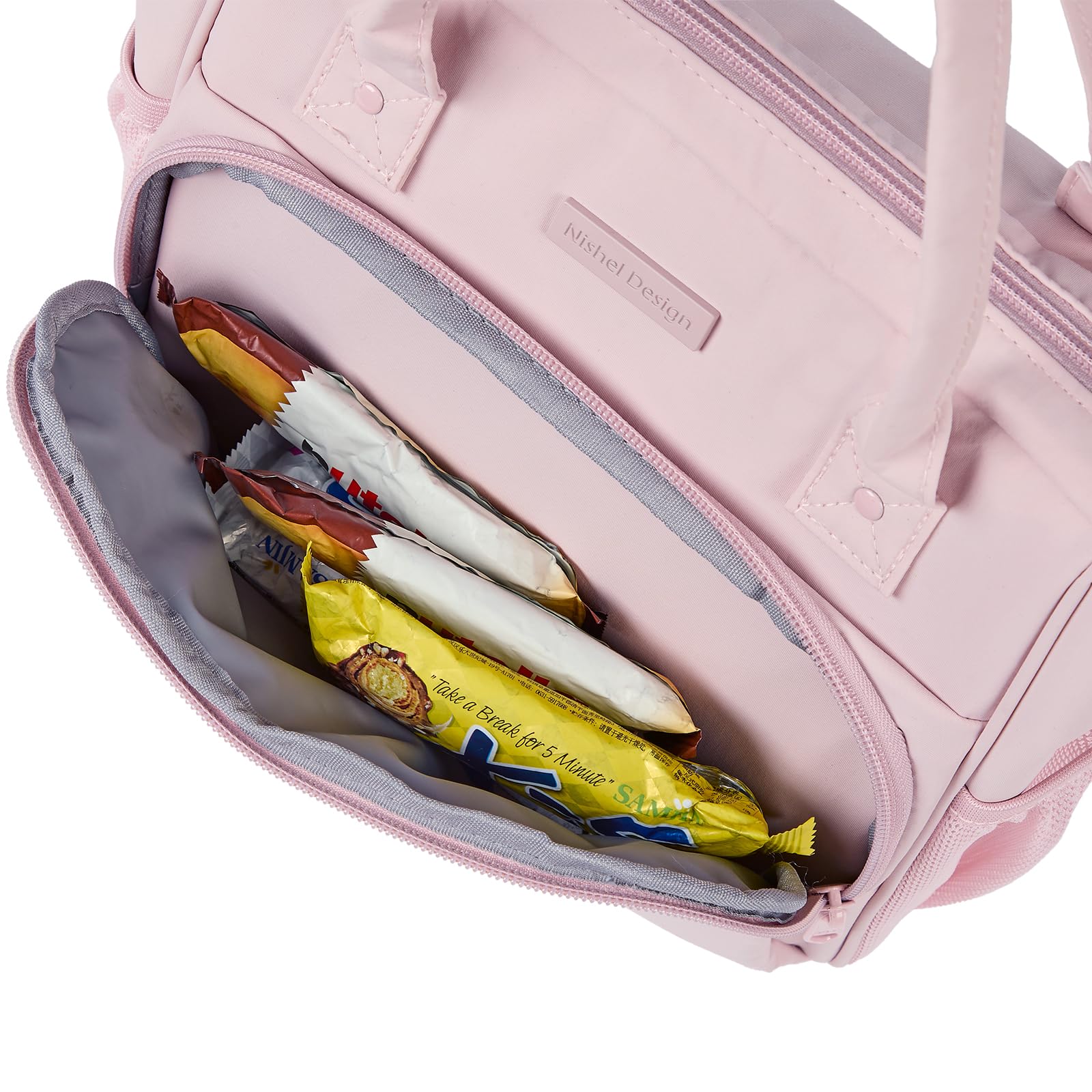 Wide opening top and reinforced handles on NISHEL lunch bag pink