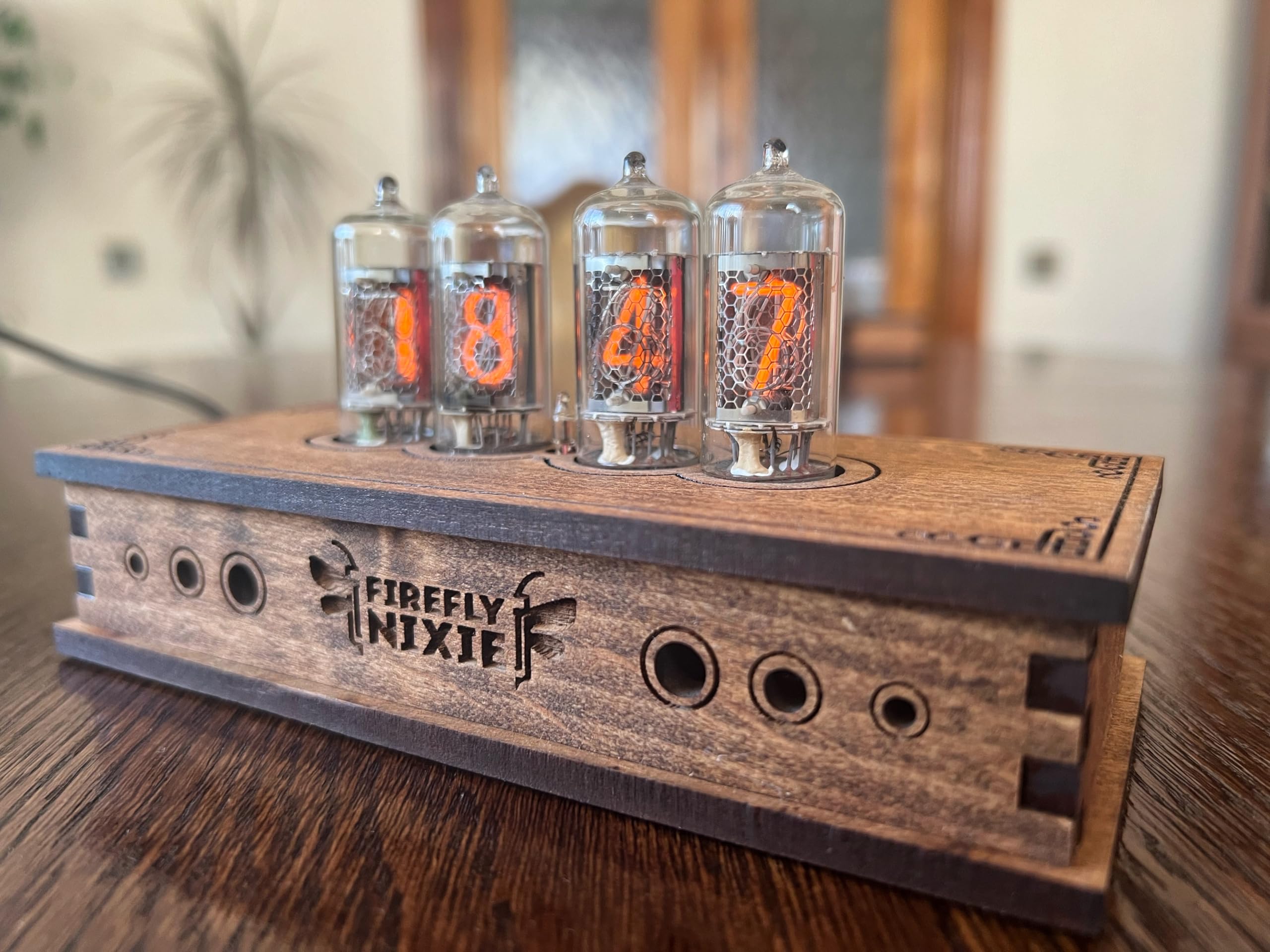Close up of Z573 nixie tubes warm orange glow