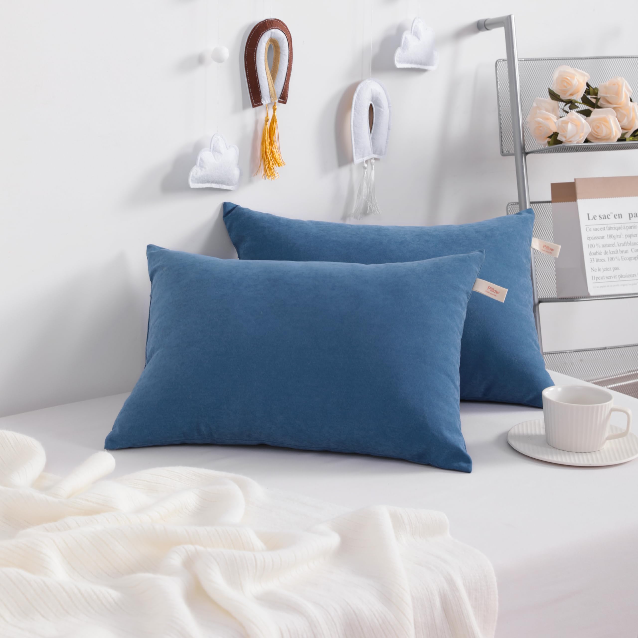 Two 11x7 inch mini pillows with microfiber filling
