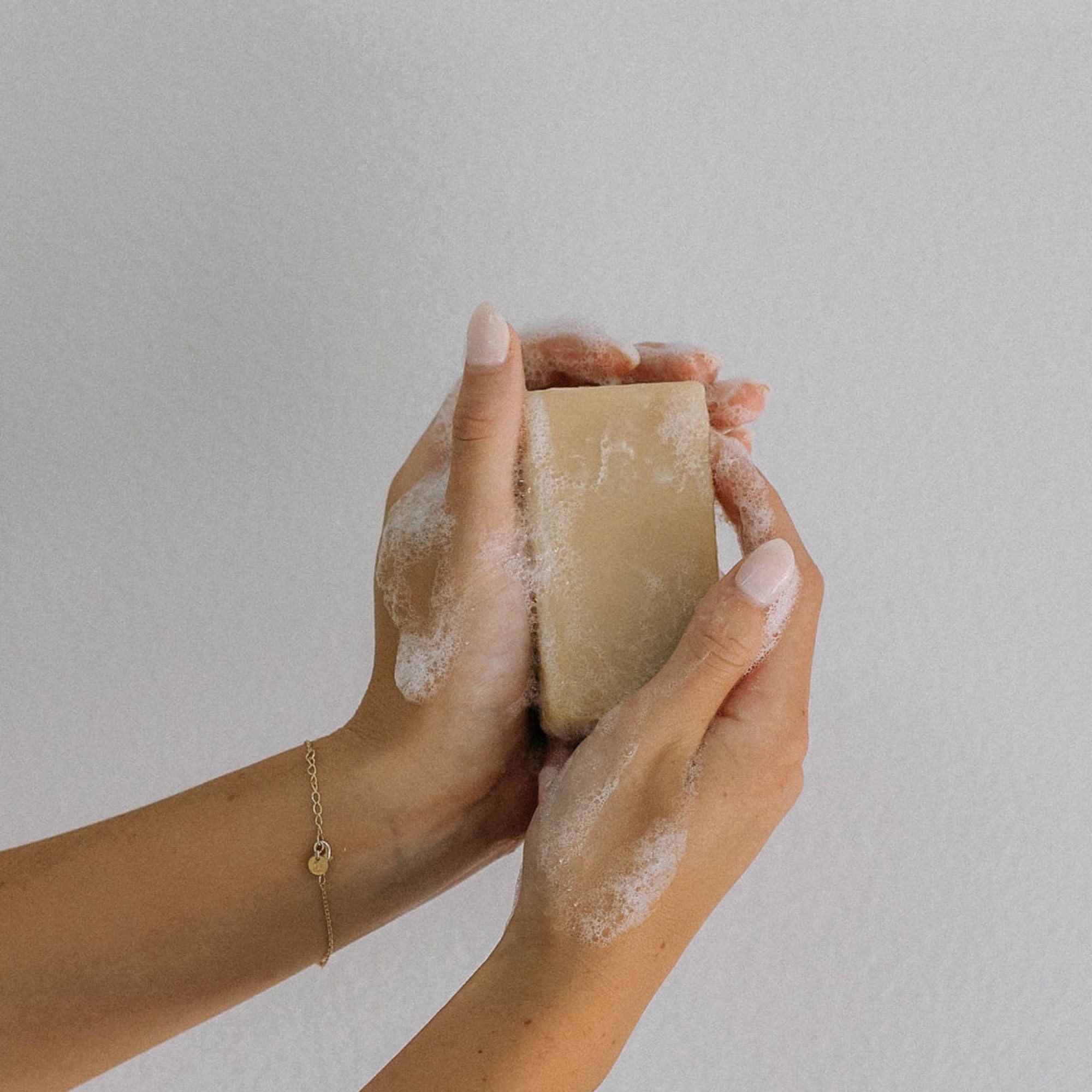 Coconut olive oil based soap bar with oats and honey