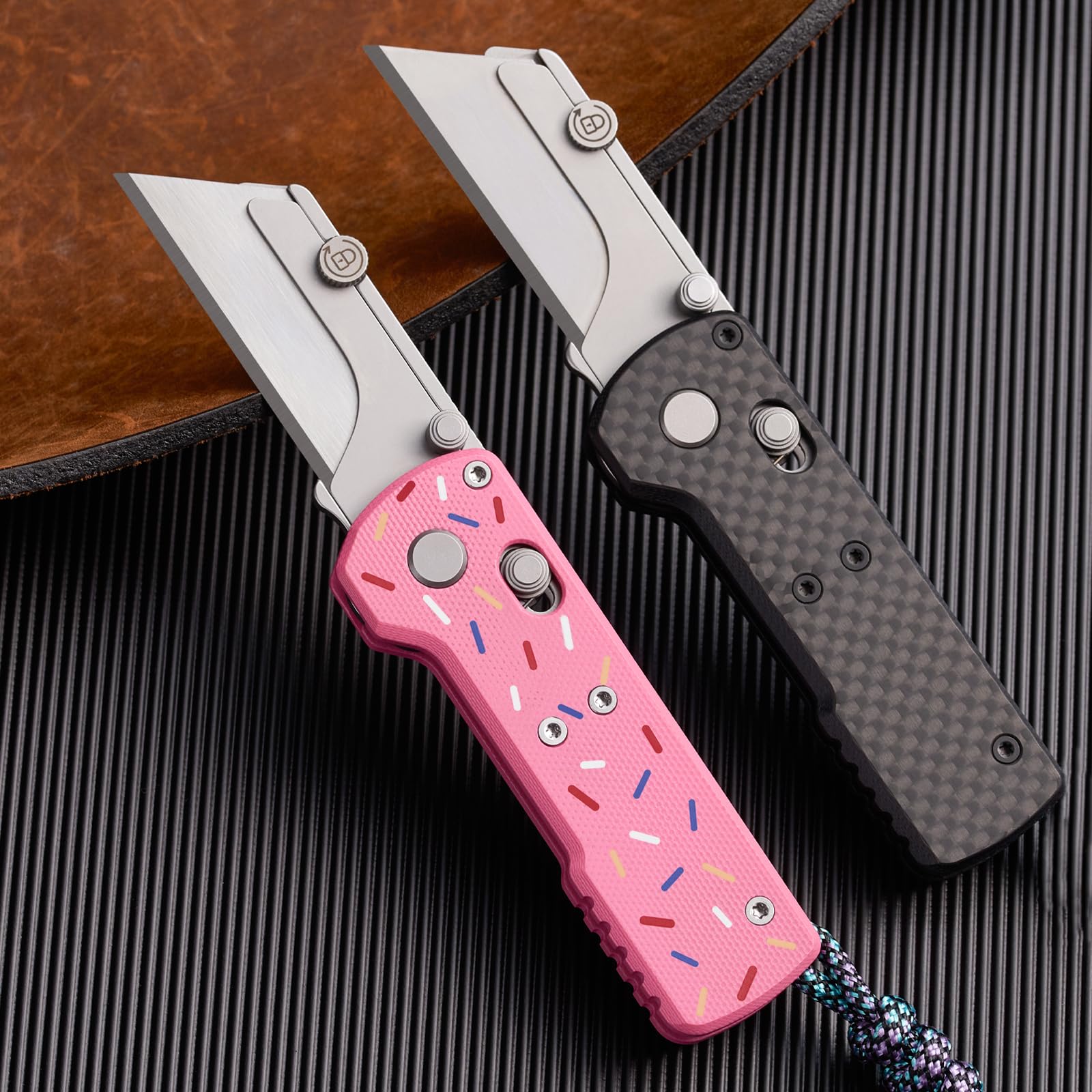 Wear resistant durable G10 Pink handle on Otacle U1
