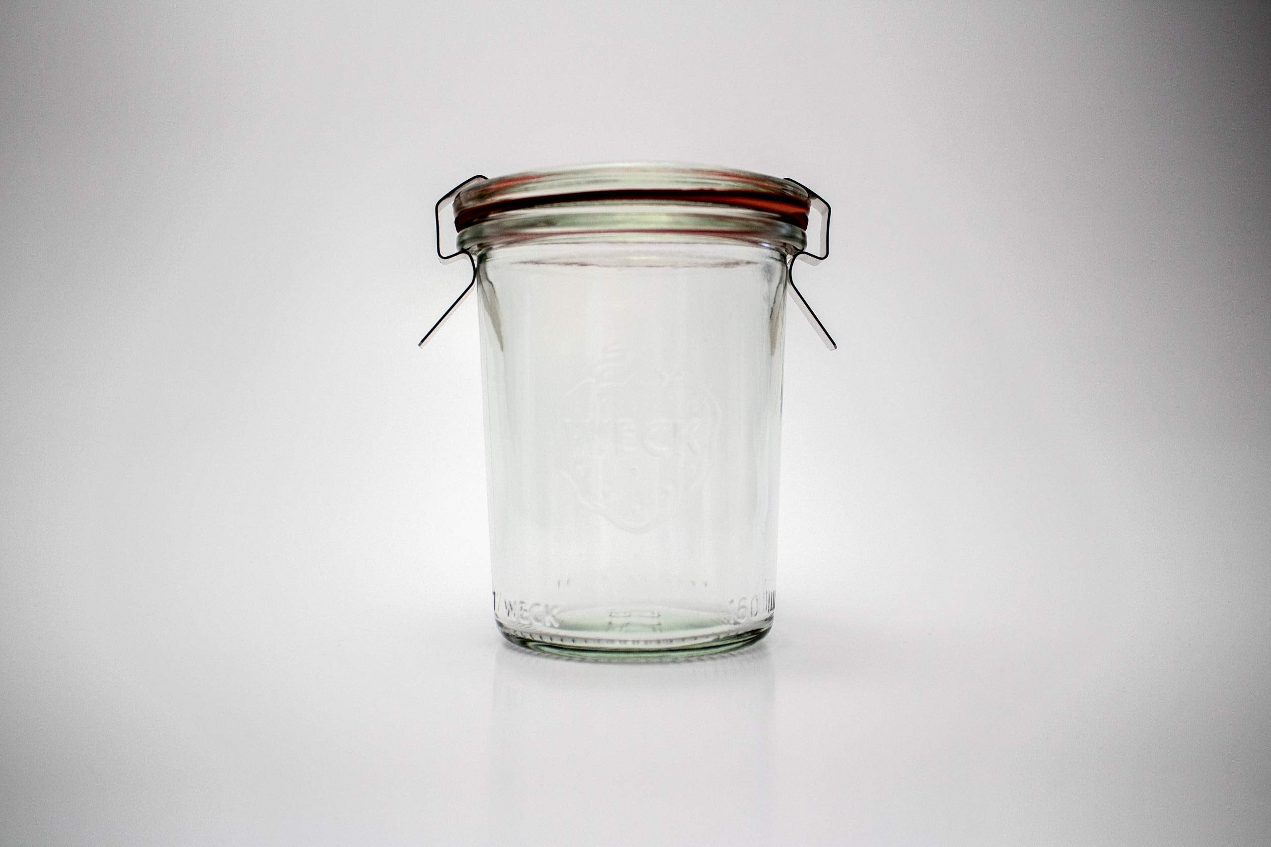 Back-of-house kitchen storage jar with wire clip fastening