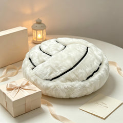 Volleyball shaped plush pillow with red thread embroidery