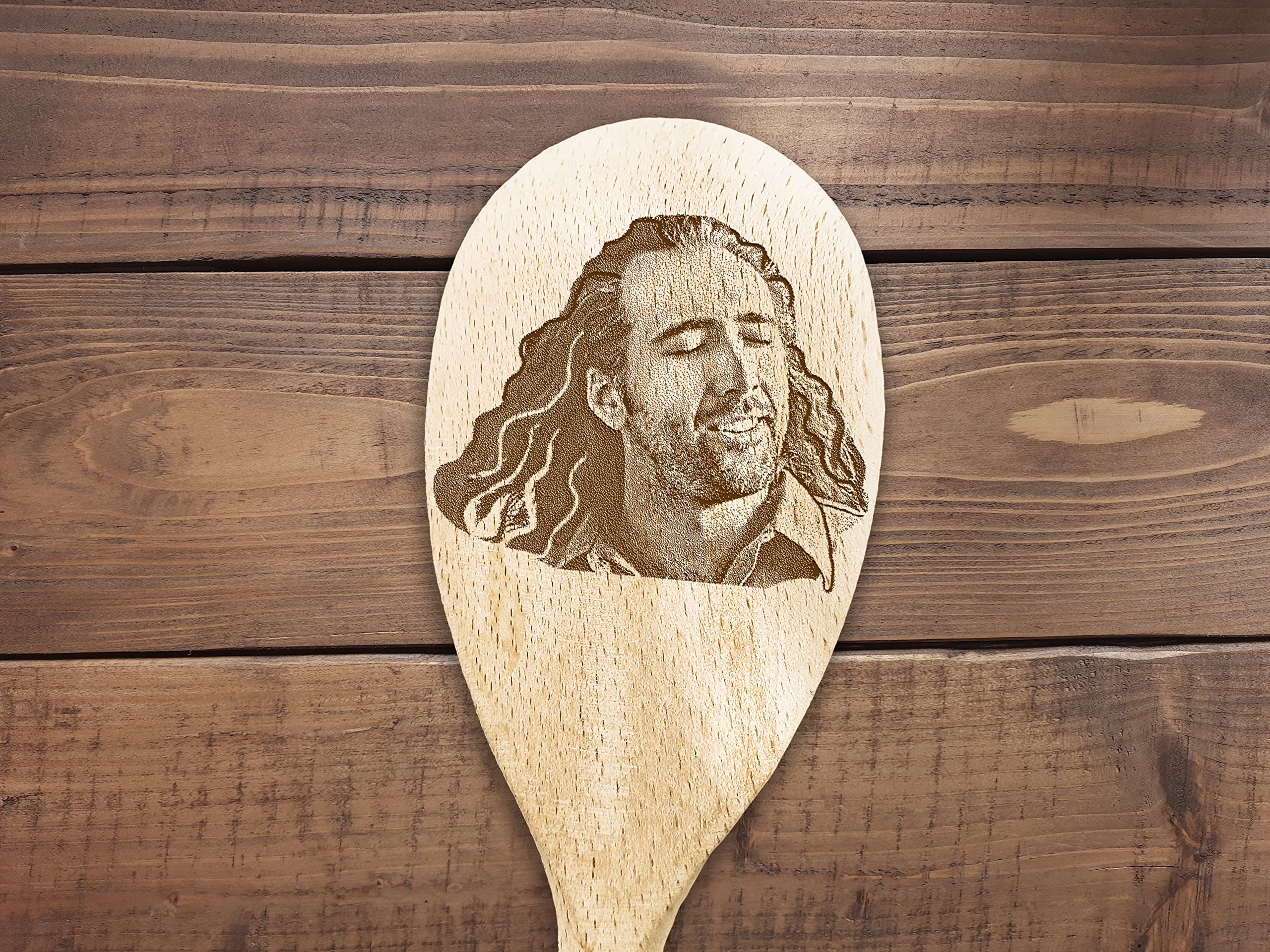 Hand-polished spoon showing natural wood texture