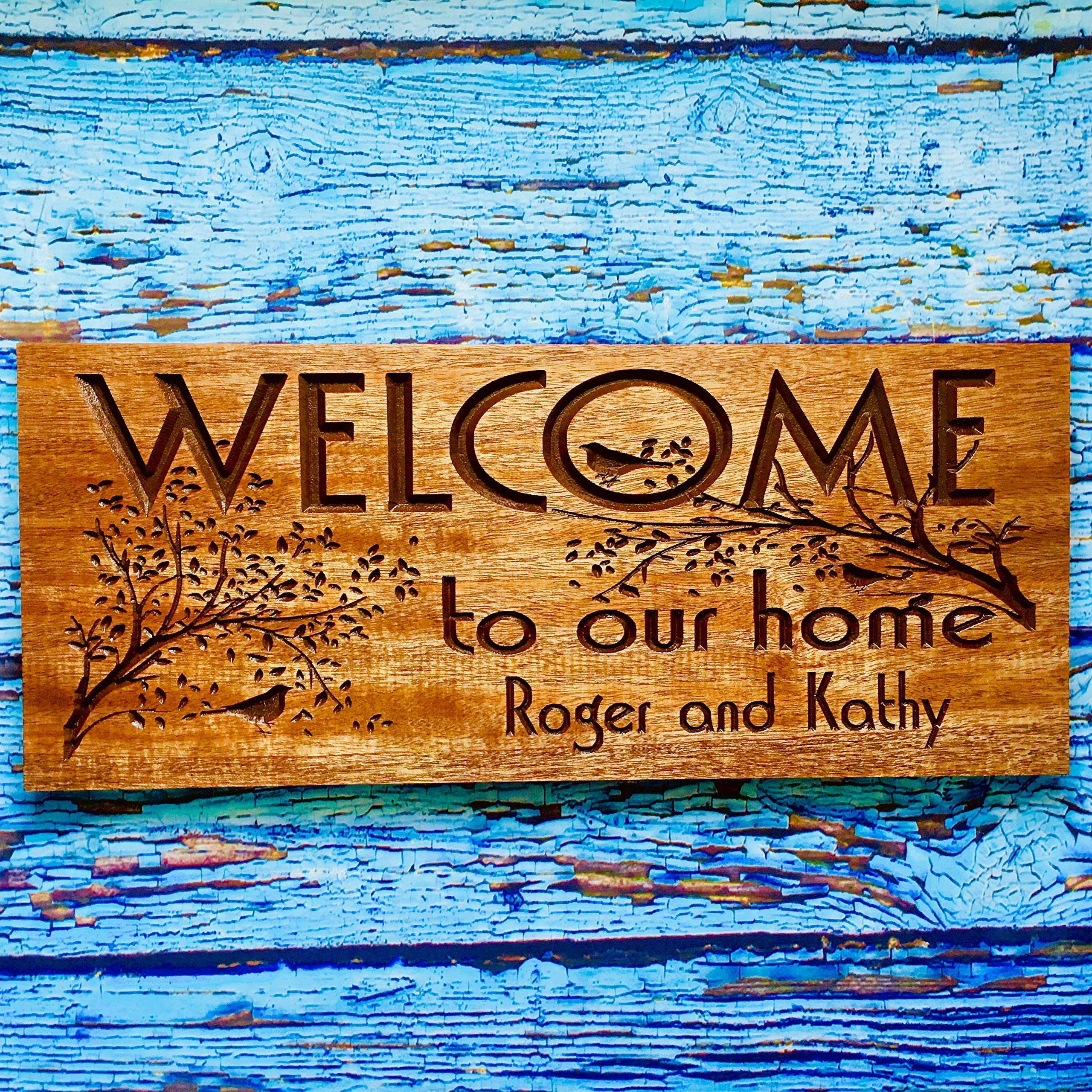 Wood sign engraving for family name outdoors