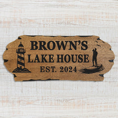 Outdoor wooden sign featuring lighthouse motif and sealer finish