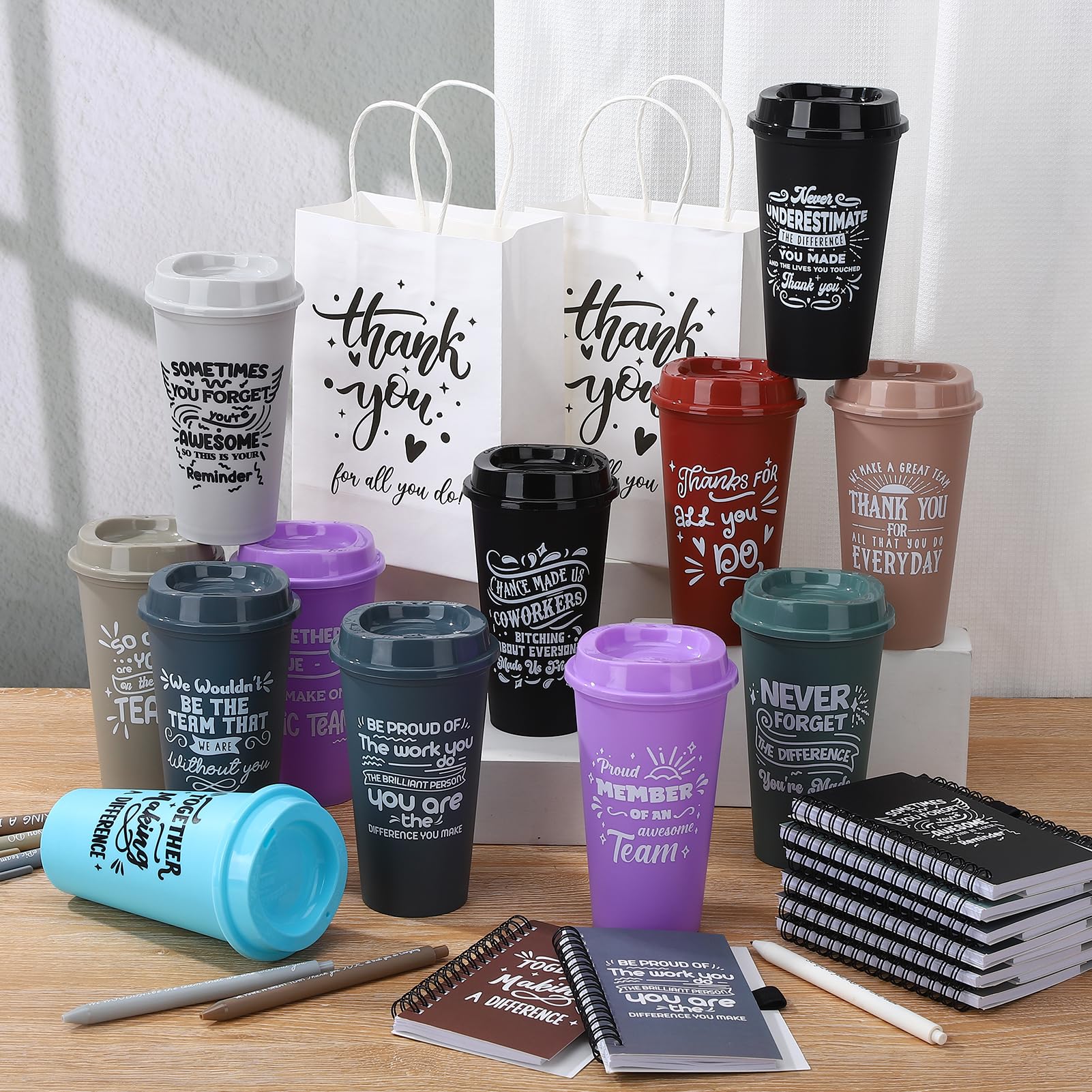 Notebooks and pens with inspirational messages
