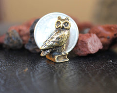 Miniature brass owl sculpture close view