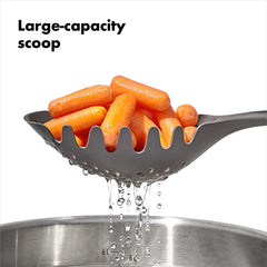 OXO Good Grips pasta scoop strainer gray ergonomic handle detail